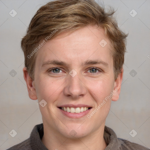 Joyful white young-adult female with short  brown hair and grey eyes