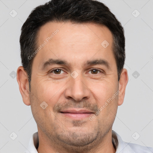 Joyful white adult male with short  brown hair and brown eyes