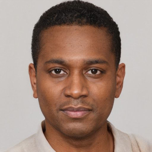Neutral black young-adult male with short  black hair and brown eyes