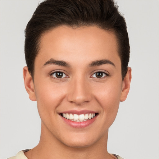 Joyful white young-adult female with short  brown hair and brown eyes