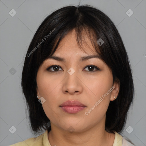 Neutral asian young-adult female with medium  brown hair and brown eyes