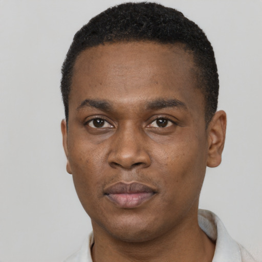 Neutral black young-adult male with short  black hair and brown eyes