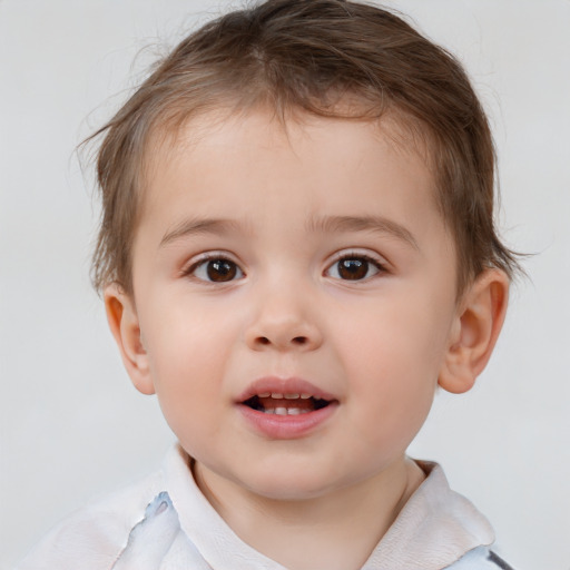 Joyful white child male with short  brown hair and brown eyes