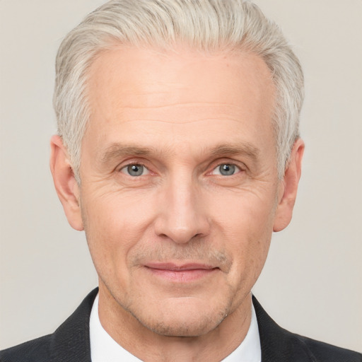 Neutral white middle-aged male with short  gray hair and grey eyes