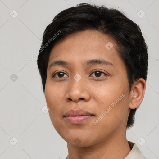 Joyful asian young-adult female with short  brown hair and brown eyes