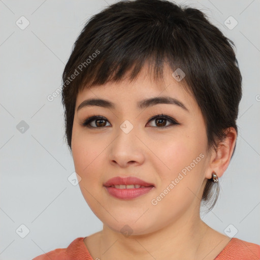 Joyful asian young-adult female with medium  brown hair and brown eyes