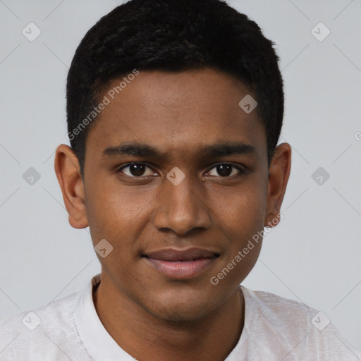 Joyful black young-adult male with short  brown hair and brown eyes