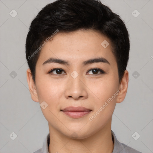 Joyful asian young-adult female with short  brown hair and brown eyes