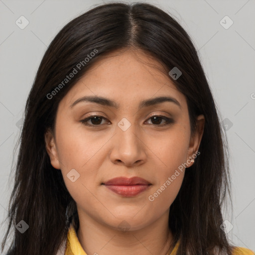 Joyful latino young-adult female with long  brown hair and brown eyes