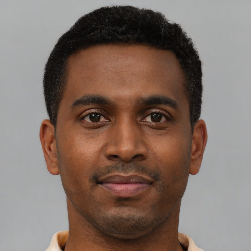 Neutral black young-adult male with short  brown hair and brown eyes