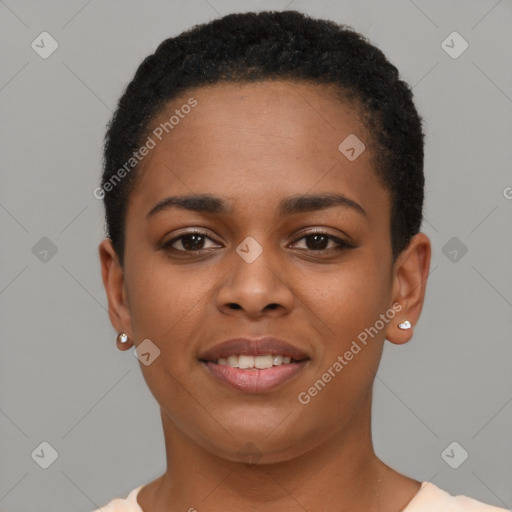 Joyful black young-adult female with short  black hair and brown eyes