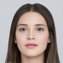 Neutral white young-adult female with long  black hair and brown eyes