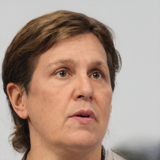 Neutral white adult female with short  brown hair and brown eyes