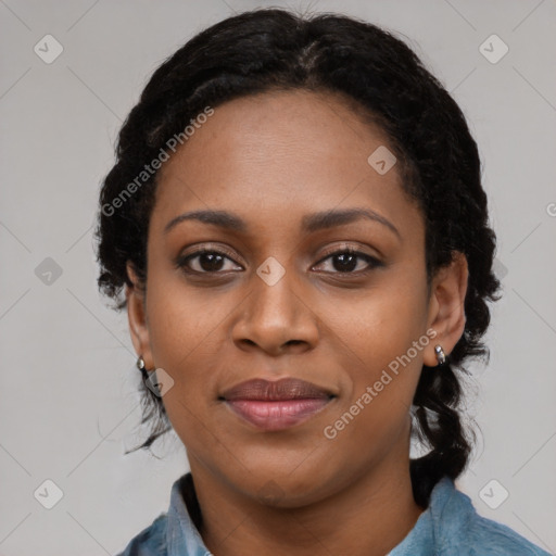 Joyful black young-adult female with medium  black hair and brown eyes