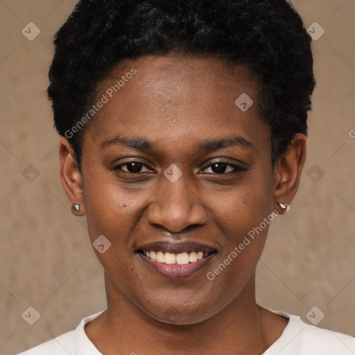 Joyful black young-adult female with short  black hair and brown eyes