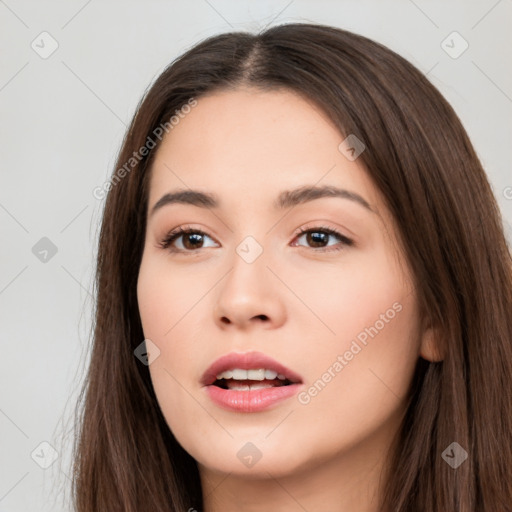 Neutral white young-adult female with long  brown hair and brown eyes