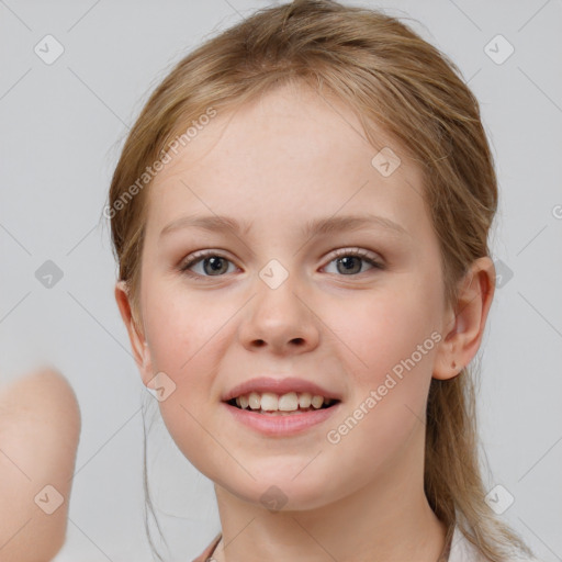 Joyful white child female with medium  brown hair and brown eyes