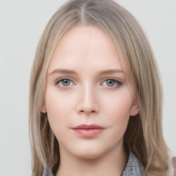 Neutral white young-adult female with medium  brown hair and grey eyes