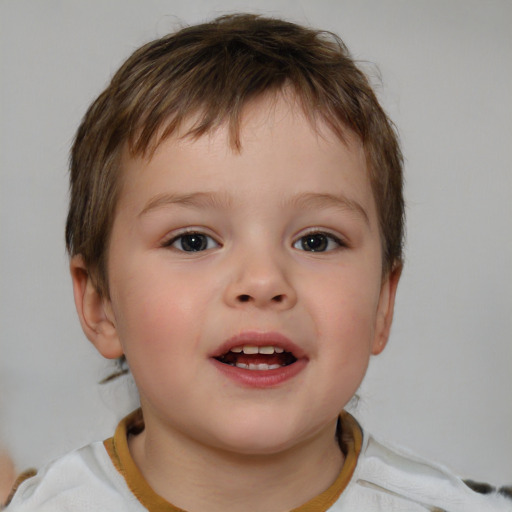 Joyful white child male with short  brown hair and brown eyes