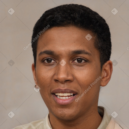 Joyful black young-adult male with short  black hair and brown eyes