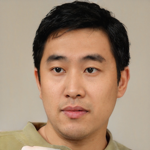 Neutral asian young-adult male with short  black hair and brown eyes