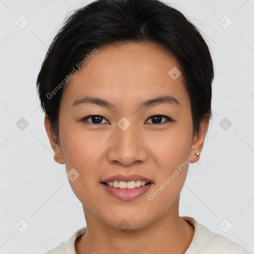 Joyful asian young-adult female with short  brown hair and brown eyes