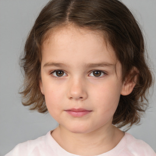 Neutral white child female with medium  brown hair and brown eyes