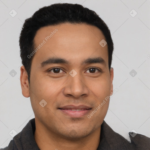 Joyful latino young-adult male with short  black hair and brown eyes