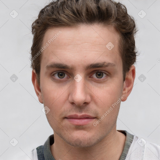 Neutral white young-adult male with short  brown hair and grey eyes