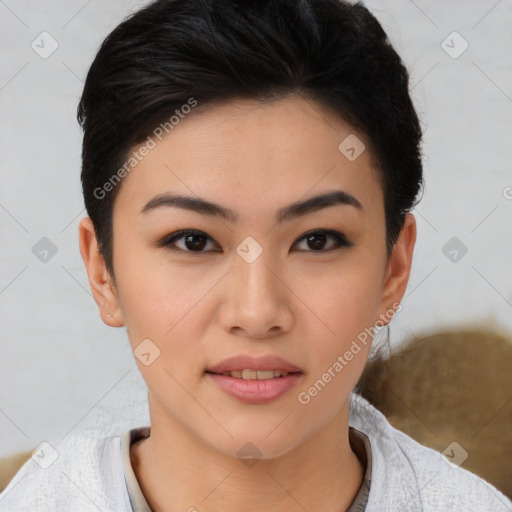 Joyful asian young-adult female with short  brown hair and brown eyes