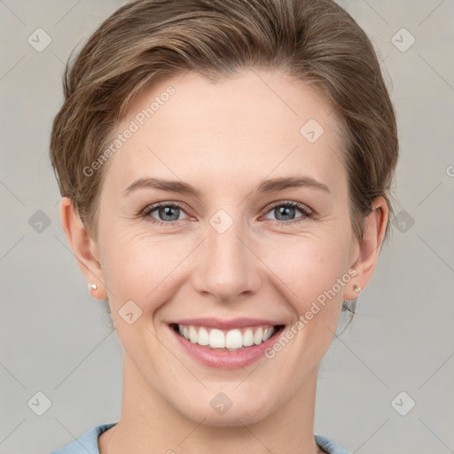 Joyful white young-adult female with short  brown hair and grey eyes