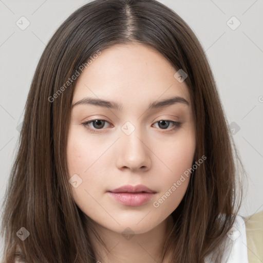 Neutral white young-adult female with long  brown hair and brown eyes