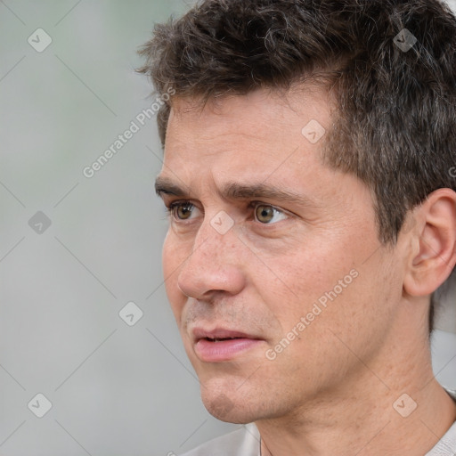 Neutral white adult male with short  brown hair and brown eyes