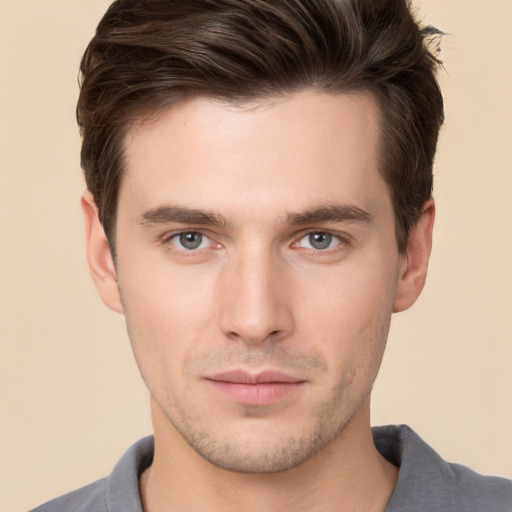 Neutral white young-adult male with short  brown hair and brown eyes