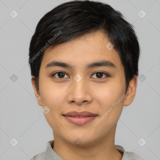 Joyful asian young-adult male with short  black hair and brown eyes