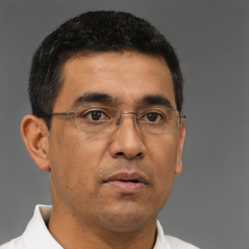 Neutral asian adult male with short  brown hair and brown eyes