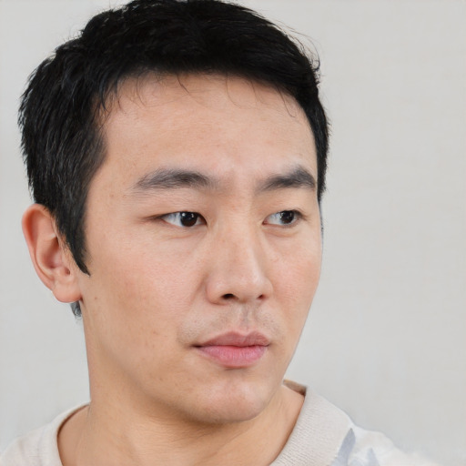 Neutral asian young-adult male with short  black hair and brown eyes