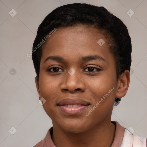 Joyful black young-adult female with short  black hair and brown eyes