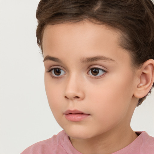 Neutral white child female with short  brown hair and brown eyes