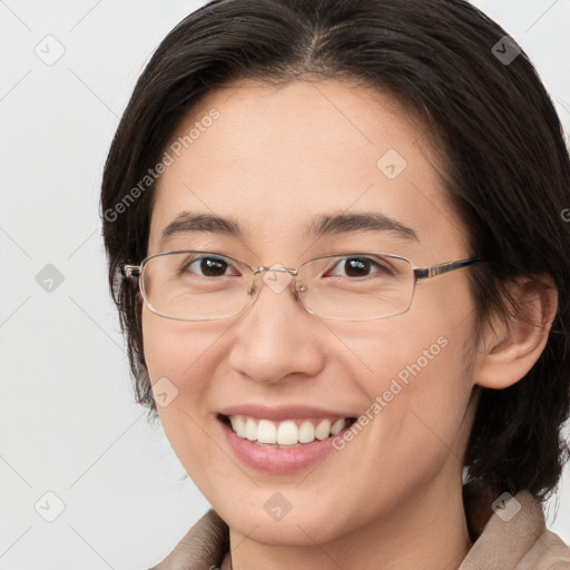 Joyful white adult female with medium  brown hair and brown eyes