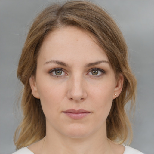 Neutral white young-adult female with medium  brown hair and brown eyes