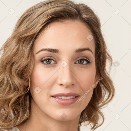 Joyful white young-adult female with long  brown hair and green eyes