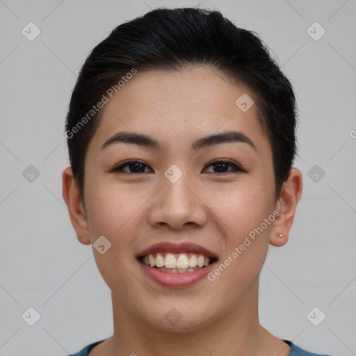 Joyful asian young-adult female with short  brown hair and brown eyes