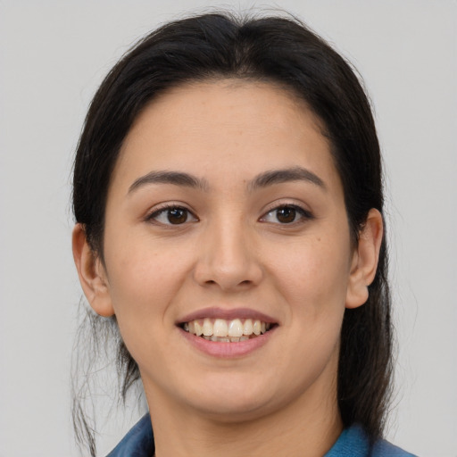 Joyful asian young-adult female with medium  brown hair and brown eyes