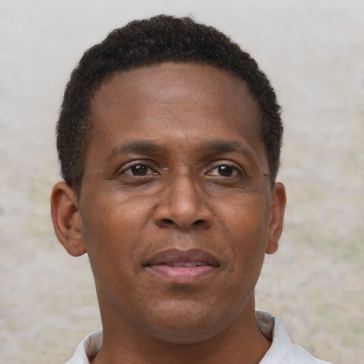 Neutral black adult male with short  brown hair and brown eyes