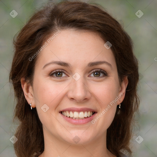 Joyful white young-adult female with medium  brown hair and green eyes