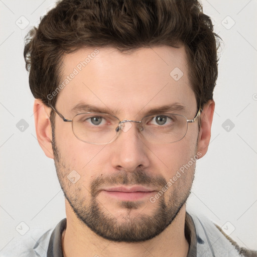 Joyful white adult male with short  brown hair and grey eyes