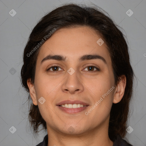 Joyful white young-adult female with medium  brown hair and brown eyes