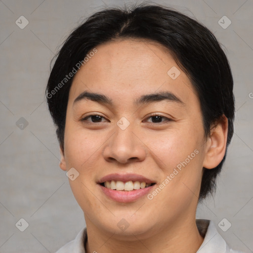 Joyful asian young-adult female with medium  brown hair and brown eyes