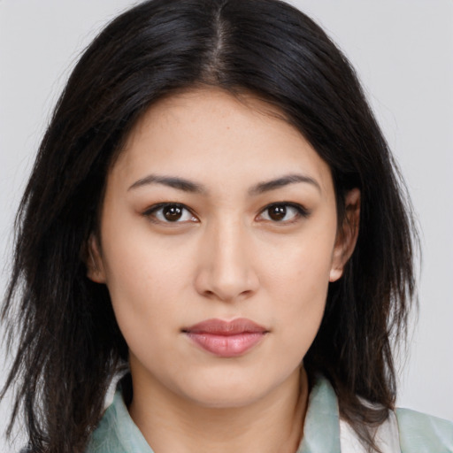 Neutral latino young-adult female with medium  brown hair and brown eyes